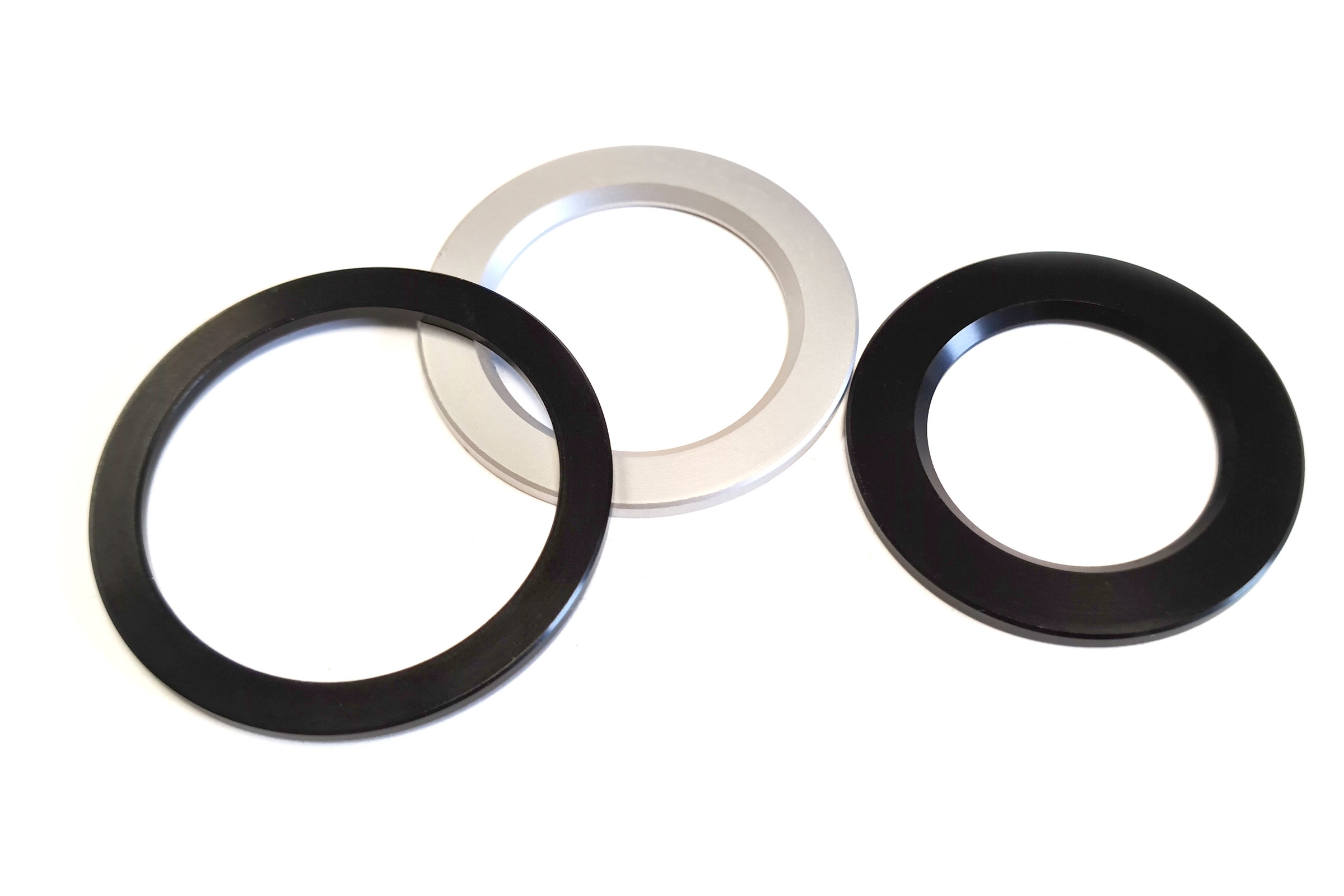 Lower steering head bearing spacer